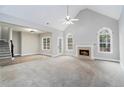 Spacious living room with a fireplace and vaulted ceiling at 114 Arborwood Way, Temple, GA 30179