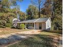 Newly painted house with a driveway and landscaping at 2887 Rockcliff Se Rd, Atlanta, GA 30316