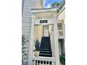 Exterior entrance with stairs leading to the unit at 12 Rumson Ct, Smyrna, GA 30080