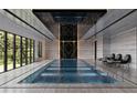 Luxury indoor pool with elegant design and large windows at 2251 Old Atlanta Rd, Cumming, GA 30041