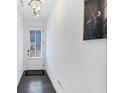 Bright entryway with dark hardwood floors and white walls at 3984 Allegretto Cir, Atlanta, GA 30339