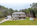 Aerial view of a two-story house with a detached garage and large backyard at 2647 Old Snapping Shoals Rd, Mcdonough, GA 30252