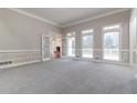 Living room with hardwood floors, fireplace and French doors at 1510 Natchez Way, Grayson, GA 30017