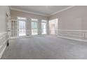 Bright living room with hardwood floors and neutral walls at 1510 Natchez Way, Grayson, GA 30017