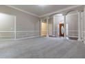 Spacious living room with hardwood floors and neutral walls at 1510 Natchez Way, Grayson, GA 30017