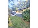 Ranch home with gray brick accents and lush green lawn at 3109 Cloverhurst Cir, East Point, GA 30344