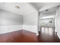 Bright dining room with hardwood floors and wainscoting at 3102 Briaroak Dr, Duluth, GA 30096