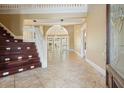 Two-story foyer with hardwood floors and elegant staircase at 5955 Tibor Nw Dr, Acworth, GA 30101