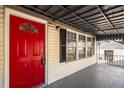 Red front door with keypad entry at 502 Lynnhaven Sw Dr, Atlanta, GA 30310