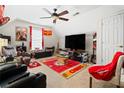 Bonus room features a large screen TV and comfortable seating at 143 Templeton Ln, Villa Rica, GA 30180