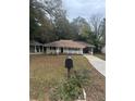 House exterior showcasing a front yard and a mailbox at 1788 Danrich Dr, Decatur, GA 30032