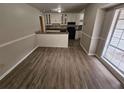 Dining room with kitchen and granite countertops at 199 Holly Springs Ct, Ellenwood, GA 30294