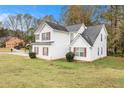 Two-story house with attached garage at 4103 Kingship Dr, Ellenwood, GA 30294