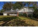 Charming ranch home with mature landscaping and attached garage at 3766 Citation Dr, Decatur, GA 30034