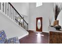 Bright entryway with hardwood floors and staircase at 48 Scenic Ovlk, Acworth, GA 30101