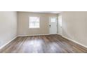 Bright living room with vinyl plank floors at 3851 Bonnie Se Ln, Atlanta, GA 30354