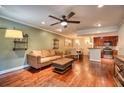 Open living and kitchen area with hardwood floors at 3650 Ashford Dunwoody Ne Rd # 802, Brookhaven, GA 30319