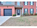 Front entrance with stone accents and landscaping at 4316 Constellation Blvd, Snellville, GA 30078