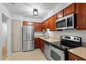 Modern kitchen with stainless steel appliances at 3705 Essex Ave, Atlanta, GA 30339