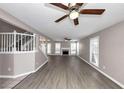 Spacious living room with hardwood floors and fireplace at 214 Kensington Trce, Stockbridge, GA 30281