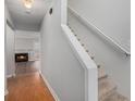 Main level entryway with hardwood floors and a view to living room fireplace at 3187 Kingswood Gln, Decatur, GA 30034