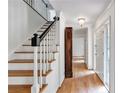 Bright entryway with hardwood floors and staircase at 2548 Mercedes Ne Dr, Atlanta, GA 30345