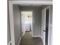 Laundry area with washer, dryer, and shelving at 2073 Marbut Ln, Lithonia, GA 30058