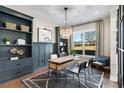 Home office with built in shelving and window seat at 729 Keystone Dr, Woodstock, GA 30188