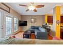 Living room with sectional sofa and hardwood floors at 4131 High Park Terrace, Atlanta, GA 30344