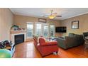 Living room with fireplace and hardwood floors at 4131 High Park Terrace, Atlanta, GA 30344