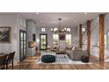 Bright and airy living room with fireplace at 176 Railroad St, Canton, GA 30114