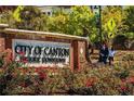 City of Canton Historic Downtown entrance with walking pedestrians at 172 Railroad St, Canton, GA 30114