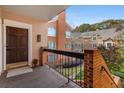 Private balcony with brick stairs and view of courtyard at 5356 Brooke Ridge Dr, Dunwoody, GA 30338