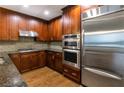 Modern kitchen with stainless steel appliances and granite countertops at 270 17Th Nw St # 1108, Atlanta, GA 30363