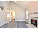 Spacious living room with hardwood floors and high ceilings at 6315 Wellington Walk Way, Lithonia, GA 30058