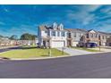 Townhome community with well-maintained landscaping at 2615 Quarterdeck Dr, Cumming, GA 30041