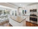 Spacious kitchen with a large island, perfect for entertaining at 1909 Nantucket Dr, Woodstock, GA 30189