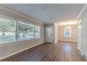 Bright living room featuring hardwood floors and large windows at 2301 Delowe Dr, Atlanta, GA 30344