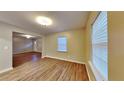 Bright dining area with hardwood floors and view to living room at 1993 Oana St, Atlanta, GA 30310