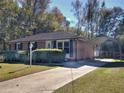 Brick ranch home with a carport and a fenced backyard at 197 Dixboro Dr, Jonesboro, GA 30238