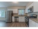 Modern kitchen with stainless steel appliances at 3289 Beech Dr, Decatur, GA 30032