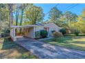 Ranch style house with carport and driveway at 3289 Beech Dr, Decatur, GA 30032