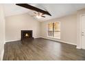 Spacious living room with fireplace and vaulted ceiling at 3060 Wilkes Plantation Way, Douglasville, GA 30135