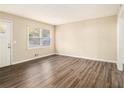Bright living room with wood-look floors and neutral walls at 3811 Paul St, Douglasville, GA 30135