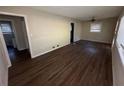 Bright living room with hardwood floors and access to other rooms at 214 Thornton Sw St, Atlanta, GA 30315