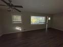 Spacious living room featuring hardwood floors and large windows at 214 Thornton Sw St, Atlanta, GA 30315