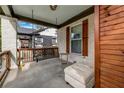 Relaxing front porch with a swing and seating area at 3220 Dogwood Dr, Hapeville, GA 30354