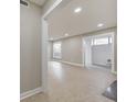 Living area with tiled floors, recessed lighting, and neutral paint at 3 Rue Fontaine, Lithonia, GA 30038