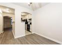 Bright dining area with hardwood floors and kitchen access at 417 Tina Hely Ct, Stockbridge, GA 30281