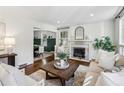 Spacious living room featuring a fireplace and ample natural light at 1837 Colland Nw Dr, Atlanta, GA 30318